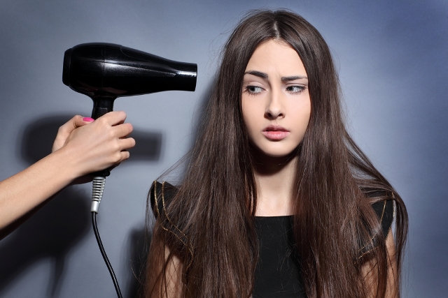 Woman-Blow-Dryer